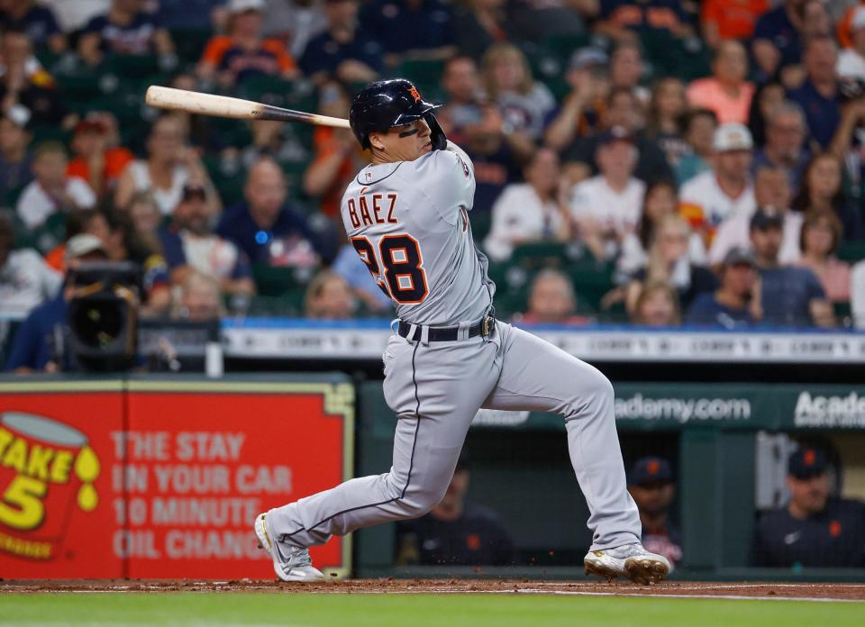 Detroit Tigers shortstop Javier Baez (28) hits a single during the first inning against the Houston Astros  on Friday, May 6, 2022, at Minute Maid Park in Houston.