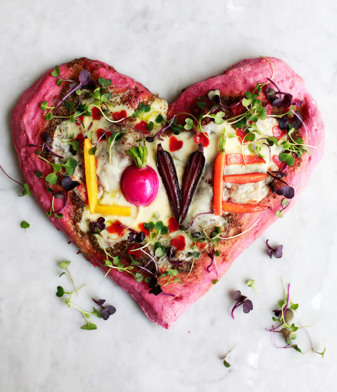 Celebrate this Valentine’s Day with a pink heart-shaped pizza. The crust gets its natural coloring from pureed beets blended into the dough. Load up the pizza with the toppings of your choice: mini pepperoni pieces cut into hearts, or baby vegetables that you use to spell words of romance. Or both!