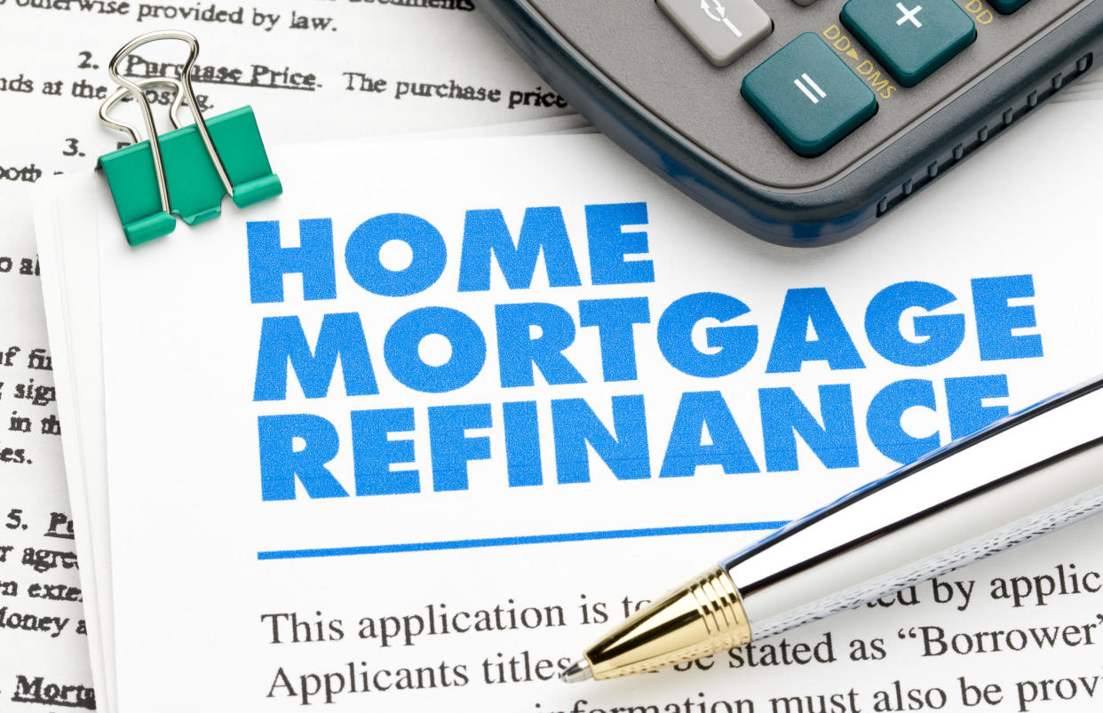 A mortgage refinance loan can potentially save you thousands of dollars.  / Credit: Bill Oxford / Getty Images