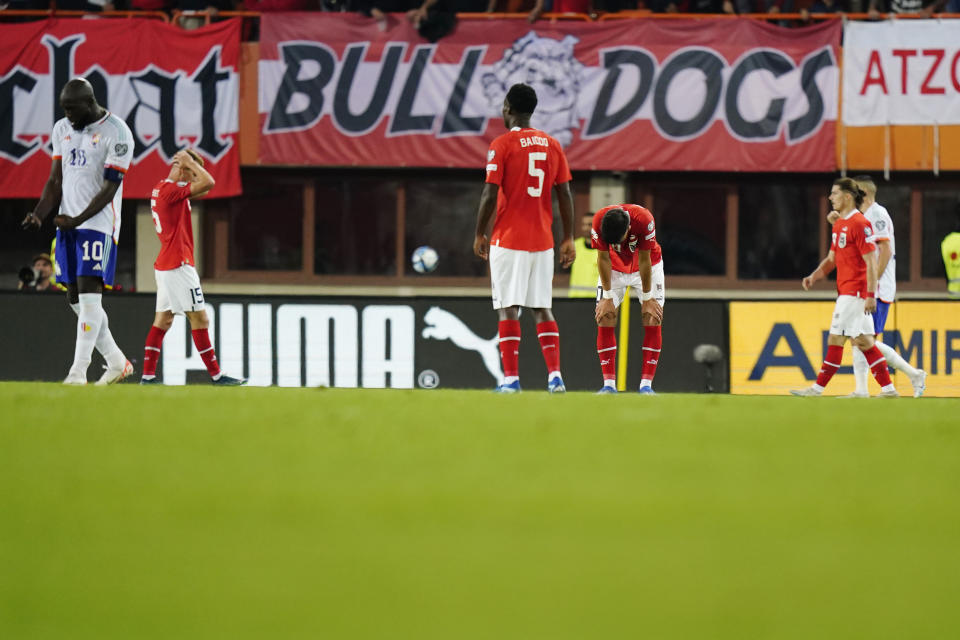 Austria's players react at the end of the Euro 2024 group F qualifying soccer match between Austria and Belgium at the Ernst Happel stadium in Vienna, Austria, Friday, Oct. 13, 2023. Belgium won 3-2. (AP Photo/Florian Schroetter)