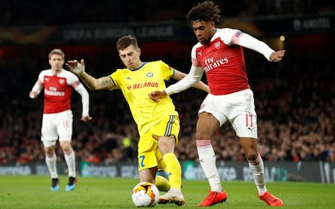 Arsenal's Alex Iwobi in action with BATE Borisov's Aleksei Rios - Credit: Action Images&nbsp;