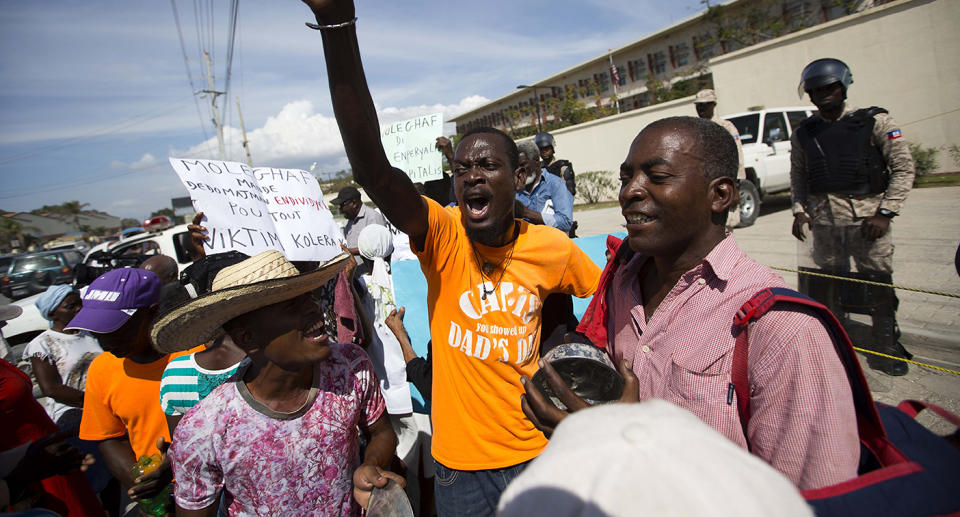 Demonstrators chant outside the U.S. Embassy in Haiti during a protest against President Trump’s recent disparaging comments. (AP)