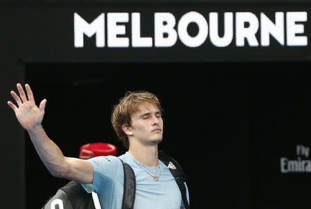 Tennis - Australian Open - Rod Laver Arena, Melbourne, Australia, January 20, 2018. Alexander Zverev of Germany waves as he leaves after losing against Chung Hyeon of South Korea. REUTERS/Thomas Peter
