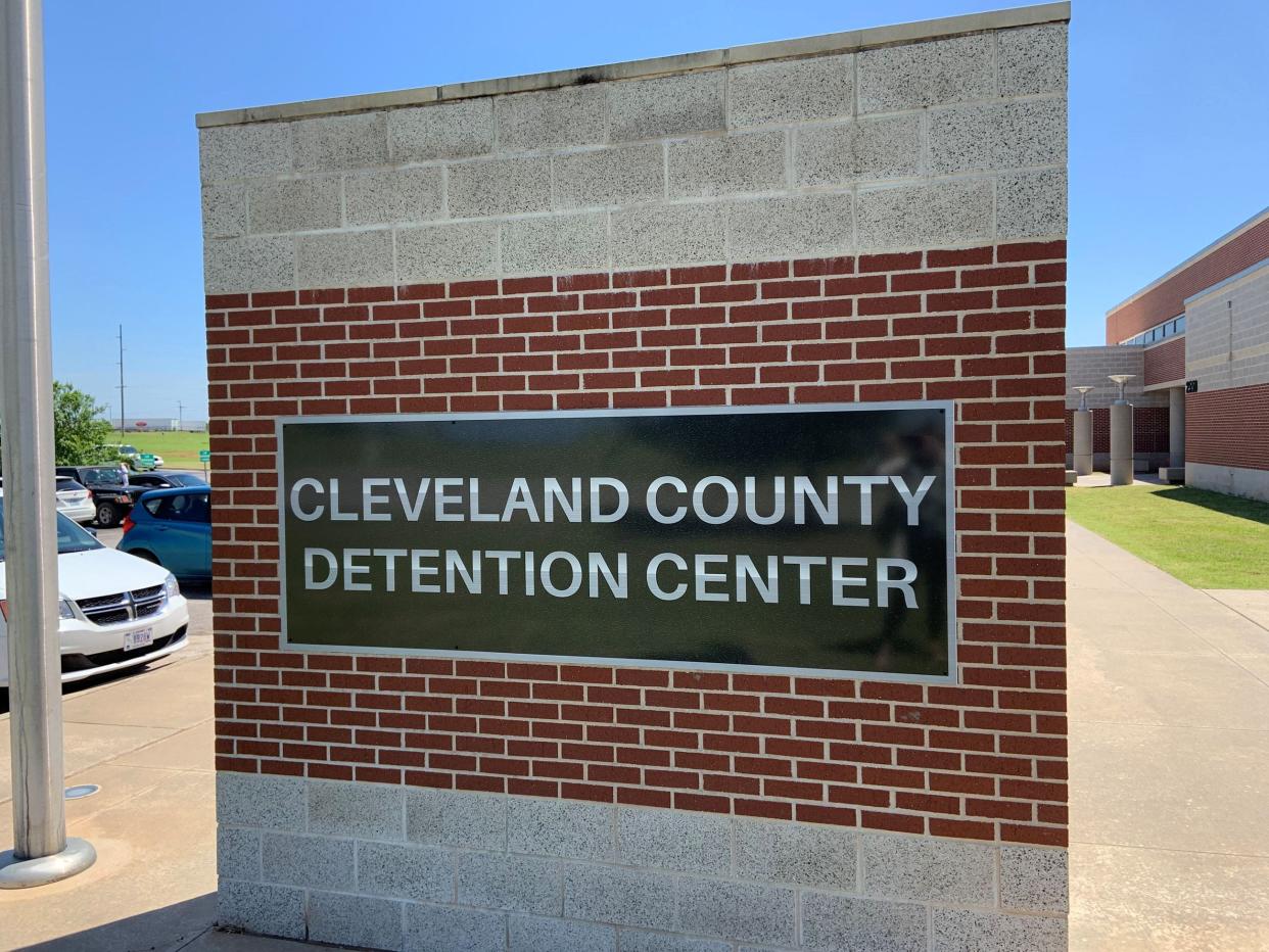 Signage for the Cleveland County jail is pictured, with the facility in the background.