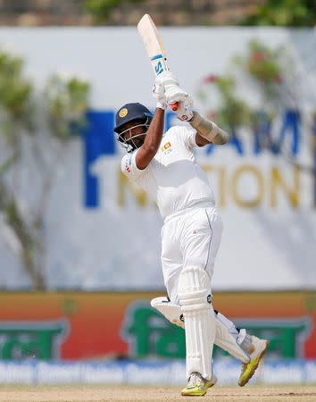 Cricket - Sri Lanka v India - First Test Match - Galle, Sri Lanka - July 28, 2017 - Sri Lanka's Dilruwan Perera plays a shot. REUTERS/Dinuka Liyanawatte