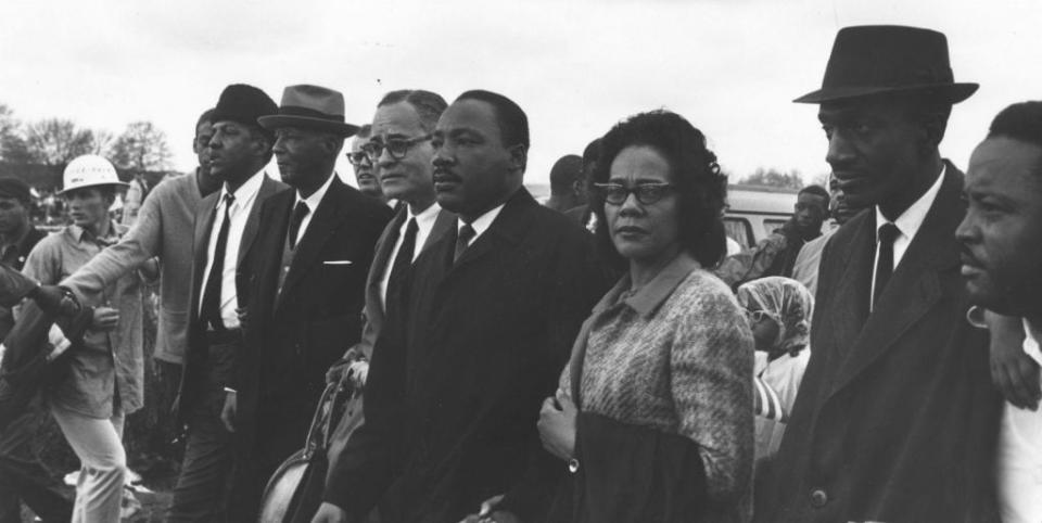 American civil rights leader Martin Luther King (1929 – 1968) (centre) with his wife Coretta Scott King and colleagues during a civil rights march from Selma, Alabama, to the state capital in Montgomery. (Photo by William Lovelace/Express/Getty Images)