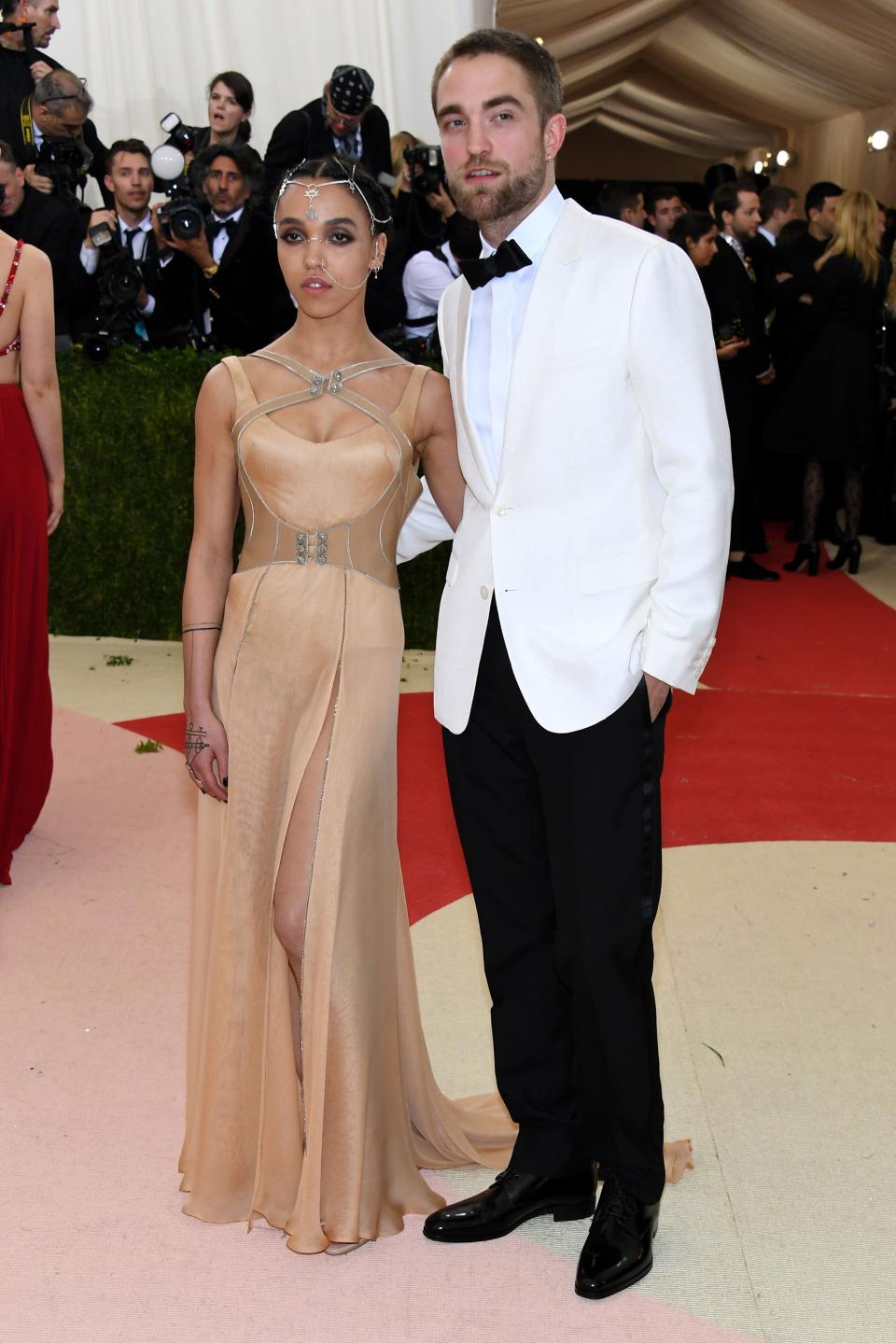 <h1 class="title">FKA twigs in Atelier Versace and Robert Pattinson in Dior Homme and Jennifer Fisher jewelry</h1><cite class="credit">Photo: Getty Images</cite>