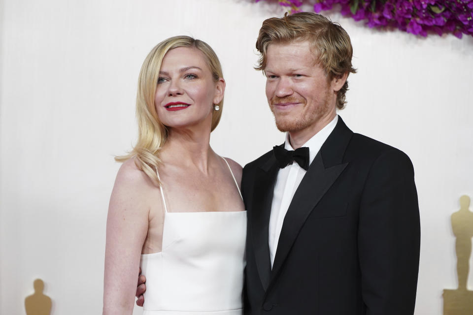 Kirsten Dunst, left, and Jesse Plemons arrive at the Oscars on Sunday, March 10, 2024, at the Dolby Theatre in Los Angeles. (Photo by Jordan Strauss/Invision/AP)