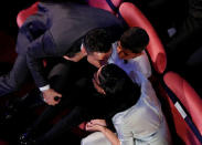 Soccer Football - The Best FIFA Football Awards - London Palladium, London, Britain - October 23, 2017 Real Madrid’s Cristiano Ronaldo kisses partner Georgina Rodriguez after winning The Best FIFA Men’s Player Award as as son Cristiano Jr. looks on Action Images via Reuters/John Sibley