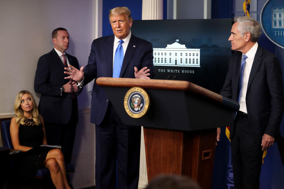 President Donald Trump speaks as Dr. Scott Atlas, a White House adviser on the coronavirus, right, and White House Press Secretary Kayleigh McEnany, far left, listen during a press briefing at the White House in Washington, on Wednesday, Sept. 23, 2020. (Oliver Contreras/The New York Times)<span class="copyright">OLIVER CONTRERAS—New York Times/Redux</span>