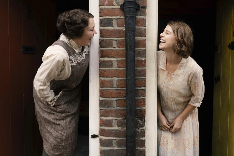 This image released by Sony Pictures Classics shows Olivia Coleman as Edith Swan, left, and Jessie Buckley as Rose Gooding in a scene from "Wicked Little Letters." (Parisa Taghizadeh/Sony Pictures Classics via AP)