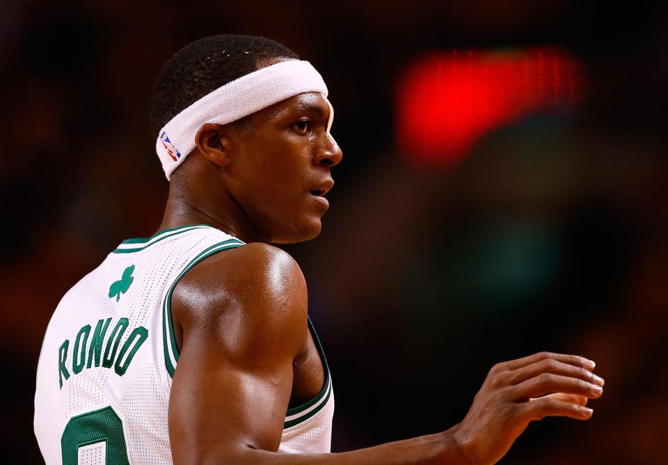 BOSTON, MA - MARCH 26:  Rajon Rondo #9 of the Boston Celtics is seen playing against the Toronto Raptors in the second half after receiving 9 stitches from a cut on his face in the second half during the game at TD Garden on March 26, 2014 in Boston, Massachusetts. NOTE TO USER: User expressly acknowledges and agrees that, by downloading and or using this photograph, User is consenting to the terms and conditions of the Getty Images License Agreement.  (Photo by Jared Wickerham/Getty Images)