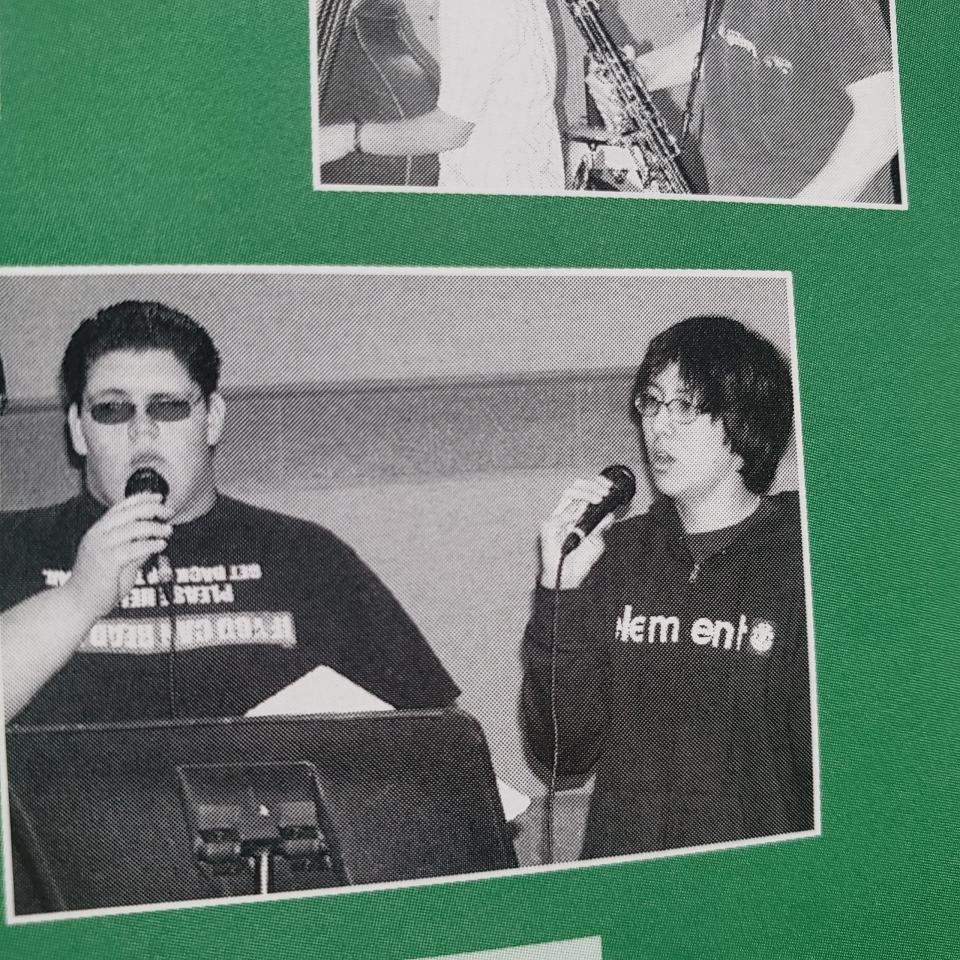 A yearbook photo of Ron Watkins, the alleged QAnon mastermind, singing with a classmate.Photo courtesy of Andrew Stiteler.