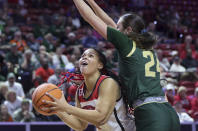 UNLV forward Nneka Obiazor (1) prepares to take a shot as Colorado State guard Sydney Mech (24) defends in the first half of an NCAA college basketball game in the semifinals of the Mountain West Conference tournament, Tuesday, March 12, 2024, in Las Vegas. (Steve Marcus/Las Vegas Sun via AP)