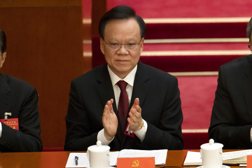 Chen Min'er, the Communist Party Secretary of Chongqing, applauds during the opening ceremony of the 20th National Congress of China's ruling Communist Party at the Great Hall of the People in Beijing, China, Sunday, Oct. 16, 2022. While Xi Jinping is primed to receive a third five-year term as head of China's ruling Communist Party at this week's congress, new members of the party's leading bodies are expected to be appointed at the meeting, whose proceedings are mainly held behind closed doors. (AP Photo/Mark Schiefelbein)