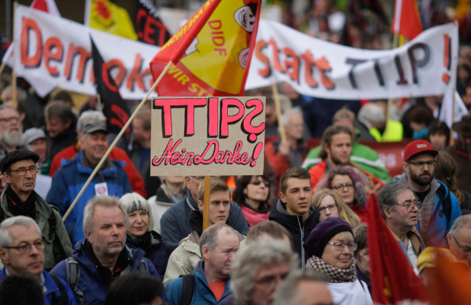 Thousands of demonstrators protest against the planned Transatlantic Trade and Investment Partnership (TTIP) and the Comprehensive Economic and Trade Agreement (CETA) ahead of a visit by President Obama in Hanover, Germany, April 23, 2016. (Markus Schreiber/AP)