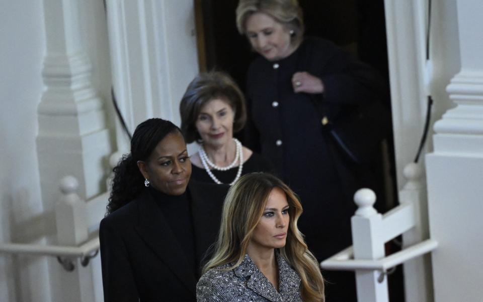 Former US Secretary of State Hillary Clinton, former US First Lady Laura Bush, former US First Lady Michelle Obama, and former US First Lady Melania Trump arrive for a tribute service for former US First Lady Rosalynn Carter, at Glenn Memorial Church in Atlanta, Georgia