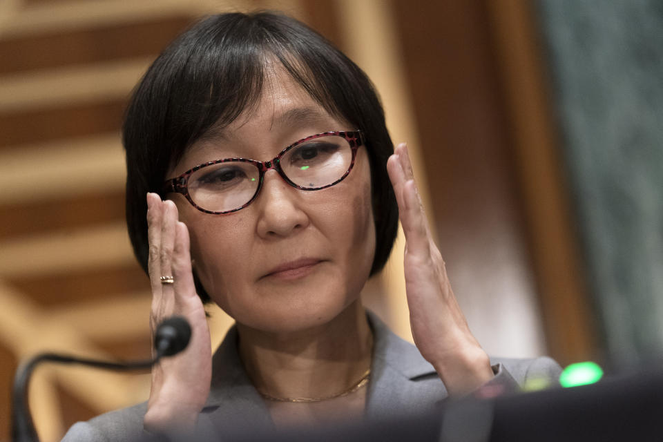 Saule Omarova of New York testifies before a Senate Banking, Housing, and Urban Affairs hearing on Capitol Hill in Washington to examine her nomination to be the Comptroller of the Currency, Thursday, Nov. 18, 2021. (AP Photo/Manuel Balce Ceneta)