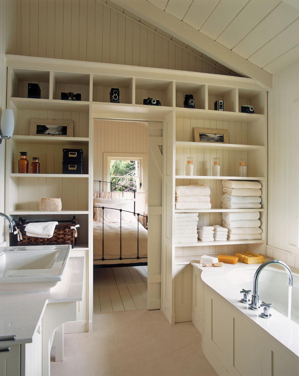 bathroom storage ideas, built in shelves all over the bathroom wall