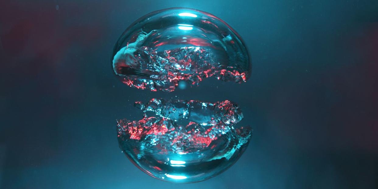 two bubbles of air, blue and red, forming two halves of a sphere