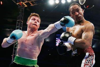 Canelo Alvare delivers a punch to James Kirkland. (Getty)