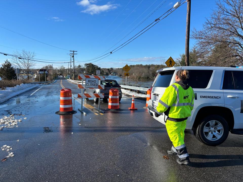 Traffic is closed on the island town of New Castle around high tide Wednesday, Jan. 10, 2024