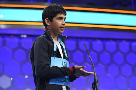 May 31, 2017; National Harbor, MD, USA; 8th grader Nikhil Lahiri from NY spelled the word guayabera (lightweight sport shirt) correctly during the 2017 Scripps National Spelling Bee at the Gaylord National Resort and Convention Center. Mandatory Credit: Jack Gruber-USA TODAY NETWORK