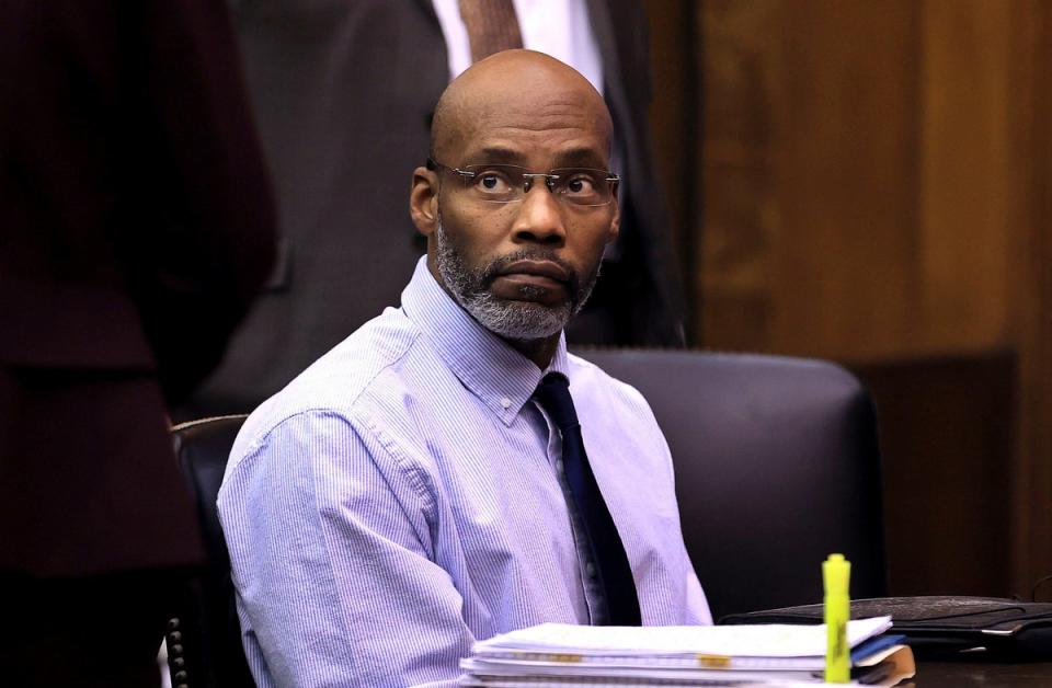 Lamar Johnson takes a seat in court at the start of his wrongful conviction hearing in St. Louis on Monday, Dec. 12, 2022 (David Carson/St. Louis Post-Dispatch via AP, Pool)