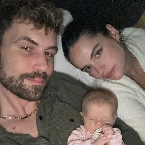 <p>Nick Viall/Instagram</p> Nick Viall (left) and fiancée Natalie Joy with their 10-week-old daughter River
