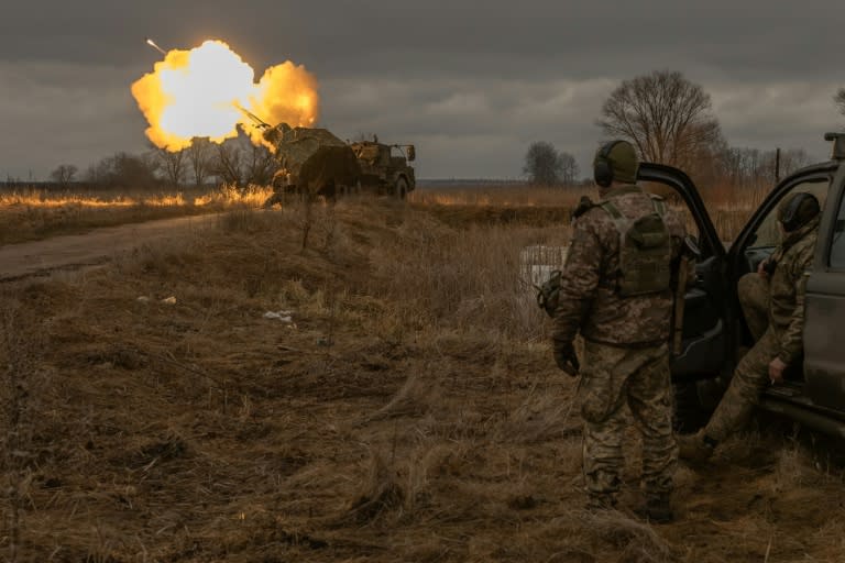 Ukrainian members of the 45th Artillery Brigade fire toward Russian positions in the Donetsk region on January 20, 2024 (Roman PILIPEY)