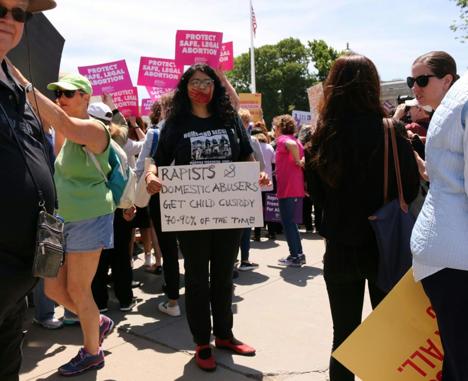 Sophie Marjanovic poses for a photo as abortion rights activists rally in front of the Supreme Court on May 21, 2019.