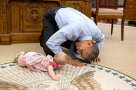 <p>“At the President’s insistence, Deputy National Security Advisor Ben Rhodes brought his daughter Ella by for a visit on June 4, 2015. As she was crawling around the Oval Office, the President got down on his hands and knees to look her in the eye.” (Pete Souza/The White House) </p>