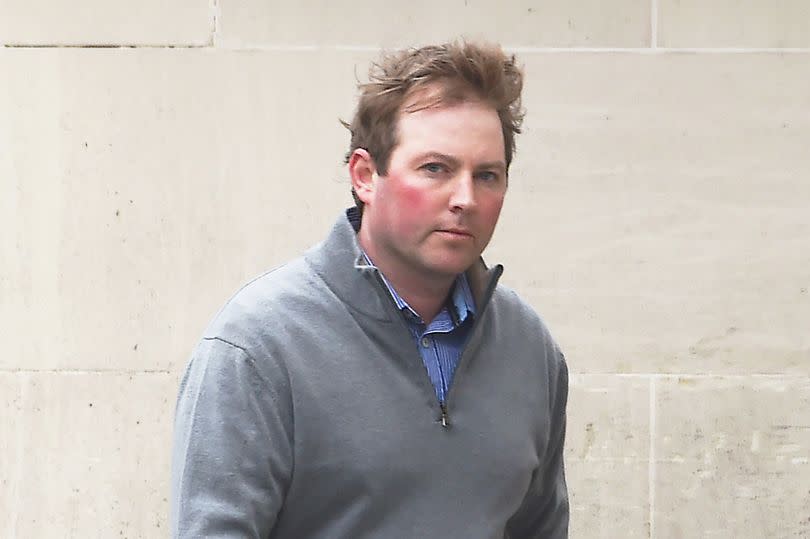 Jonathan Creswell at court in Derry in Monday in open neck shirt and half zip, looking towards camera