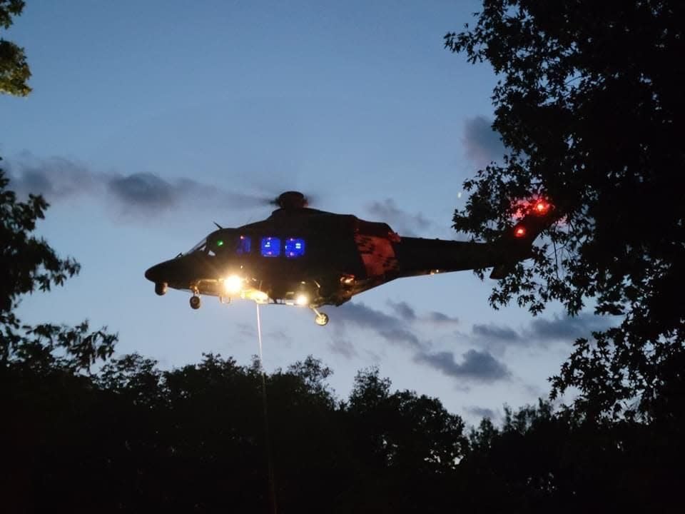 Pilots on Trooper 5, Cumberland Section, maneuvered the August AW139 helicopter 130-feet above the rocky terrain while a trooper/paramedic was lowered.