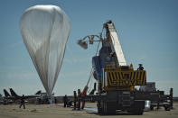 Winds twist daredevil Felix Baumgartner's huge balloon on Oct. 9, 2012, just seconds before his supersonic skydive attempt that day was called off.