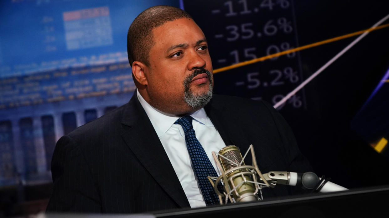 Alvin Bragg, Manhattan district attorney, stands at a microphone during an interview.