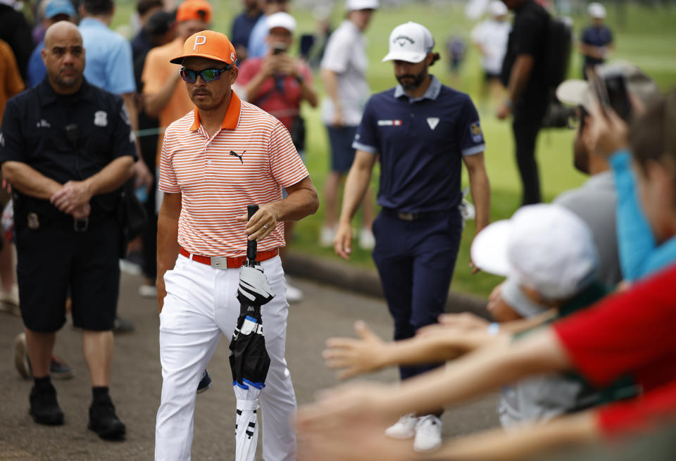 Rickie Fowler of the United States approaches the third tee box during the final round of the Rocket Mortgage Classic at Detroit Golf Club