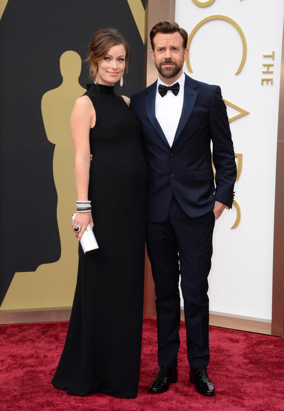 Olivia Wilde, left, and Jason Sudeikis arrive at the Oscars on Sunday, March 2, 2014, at the Dolby Theatre in Los Angeles. (Photo by Jordan Strauss/Invision/AP)