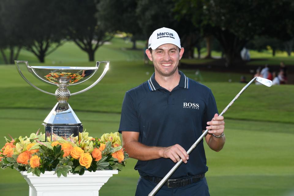 Patrick Cantlay celebrates after winning the 2021 FedEx Cup at the Tour Championship in Atlanta, Sept. 5, 2021.