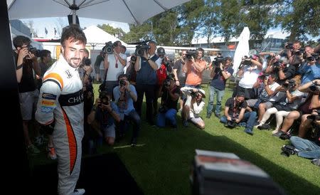 Formula One - F1 - Australian Grand Prix - Melbourne, Australia - 23/03/2017 McLaren driver Fernando Alonso of Spain poses poses during the driver portrait session at the first race of the year. REUTERS/Jason Reed