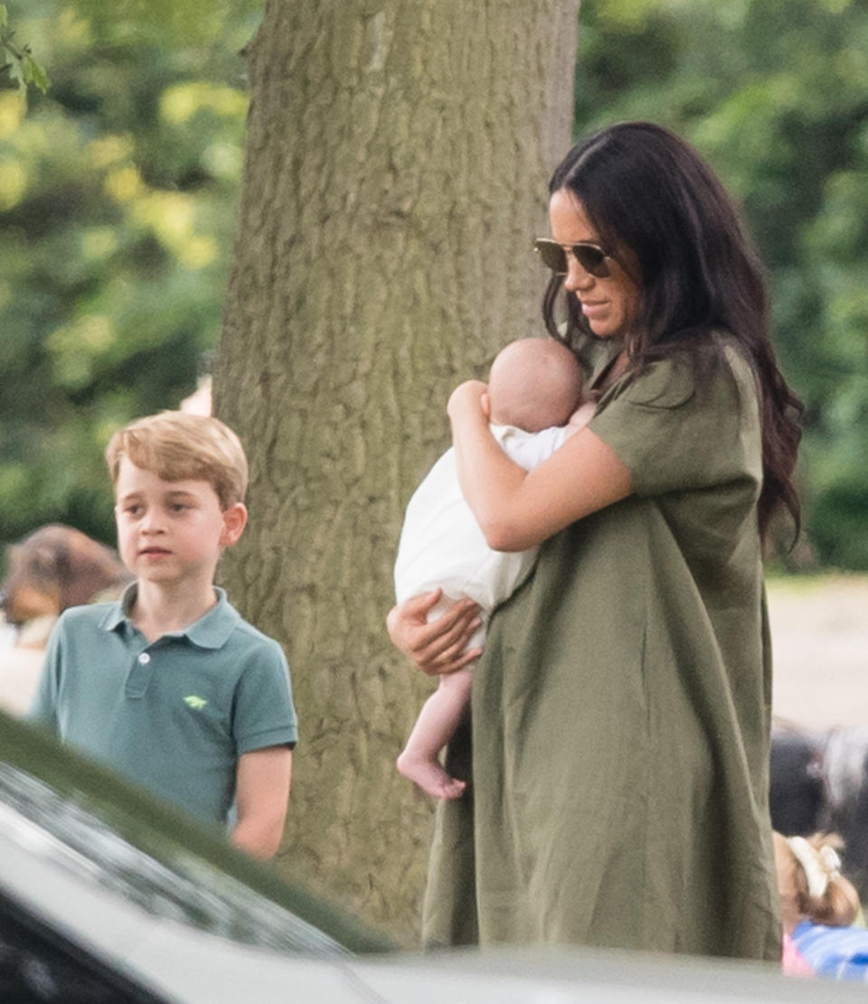 Prince George with Meghan, Duchess of Sussex and Archie Mountbatten-Windsor. (Photo by Samir Hussein/WireImage)