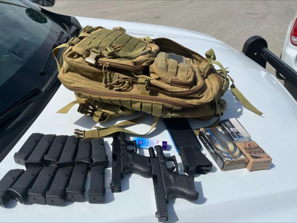 Two loaded handguns, three boxes of ammunition and 10 loaded magazines were found in the military-style bag in the emergency room work area of a Cleveland Clinic Indian River Hospital employee March 7. He was arrested and charged with introduction of a firearm into a hospital or mental health facility.