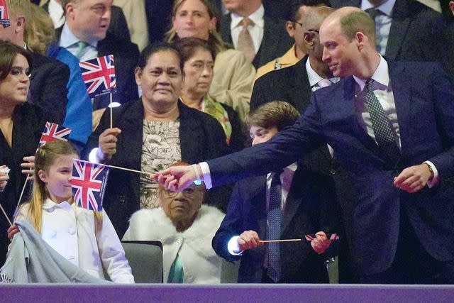 JONATHAN BRADY/POOL/AFP via Getty Princess Charlotte and Prince William at the Coronation Concert on May 7, 2023