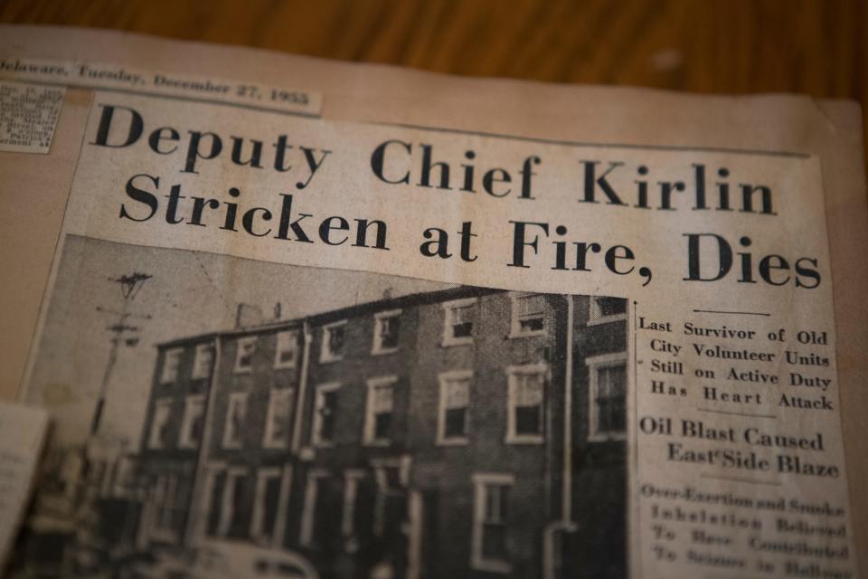  A newspaper cutout reporting the loss of fallen Wilmington Fire Department Deputy Chief Michael Kirlin, who died in the line of duty.
