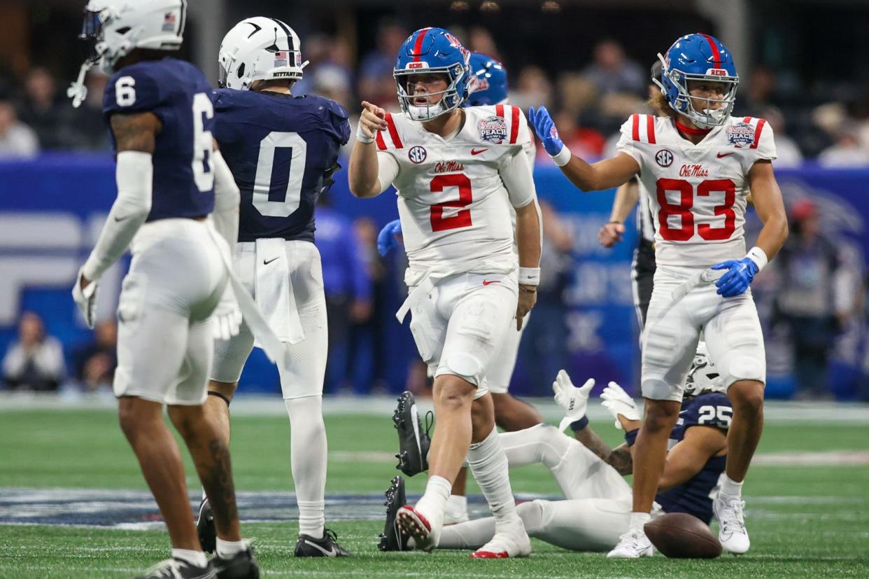 Dec 30, 2023; Atlanta, GA, USA; Mississippi Rebels quarterback Jaxson Dart (2) reacts after a first down against the Penn State Nittany Lions in the second half at Mercedes-Benz Stadium. Mandatory Credit: Brett Davis-USA TODAY Sports