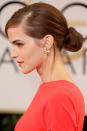 <p>A low side-parted bun is a fast route to easy elegance. Add statement earrings for extra interest. </p>