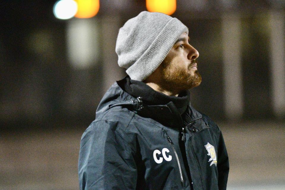 Golden West High School girls soccer head coach Jose "Chiva" Cuevas watches the team's match against Redwood on Jan. 18, 2024 at Mineral King Bowl. Cuevas, a former Farmersville standout and professional player, is in his first season as the Trailblazers' head coach.