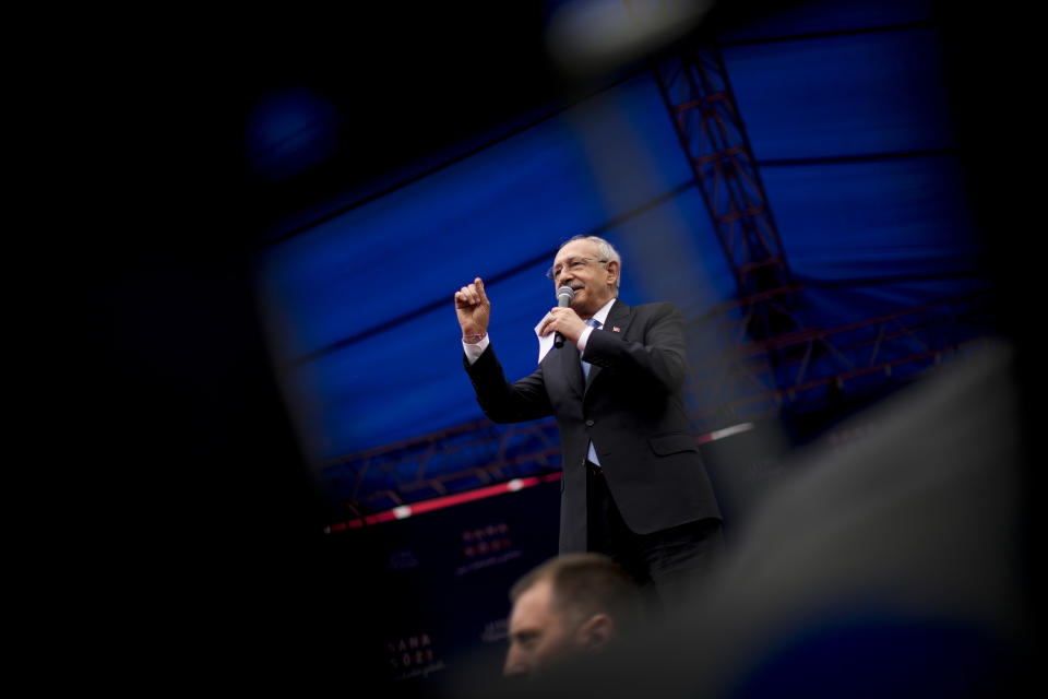 People listen to Kemal Kilicdaroglu, leader of Turkey's main opposition Republican People's Party, CHP, at a campaign rally in Tekirdag, Turkey, on Thursday, April 27, 2023. Kilicdaroglu, the main challenger to President Recep Tayyip Erdogan in the May 14 election, cuts a starkly different figure than the incumbent who has led the country for two decades. As the polarizing Erdogan has grown increasingly authoritarian, Kilicdaroglu has a reputation as a bridge builder and vows to restore democracy. (AP Photo/Francisco Seco)