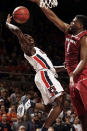 <p>Auburn guard Jared Harper (1) tries to shoot around Arkansas forward Trey Thompson (1) during the second half of an NCAA college basketball game Saturday, Feb. 25, 2017, in Auburn, Ala. (Photo: Todd J. Van Emst/AP) </p>