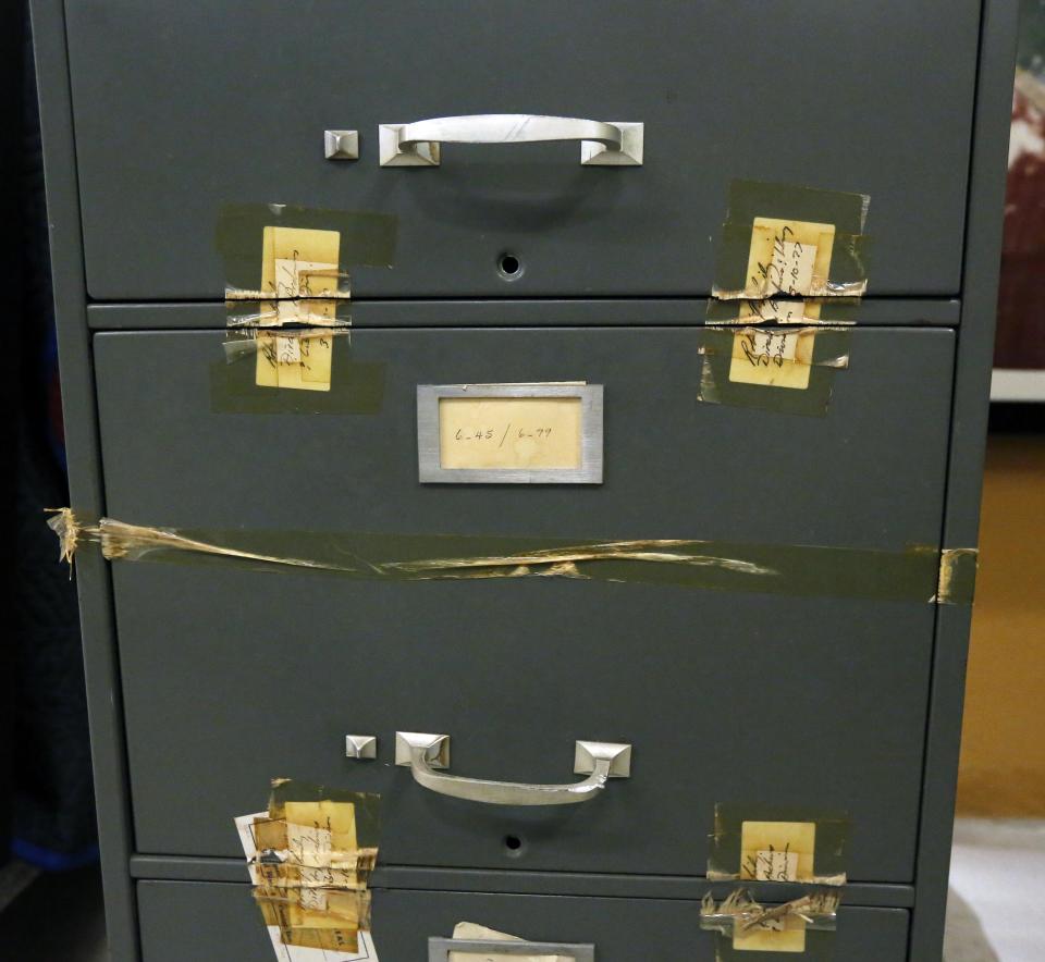 In this Oct. 11, 2013 photograph, a heavily taped file cabinet that was used by the state Sovereignty Commission, the state supported agency that spied on civil rights advocates and groups in the state, will be among the items, that will eventually be displayed in the civil rights museum in Jackson, Miss. The taping was from the sealing of the records after the agency was de-funded and disbanded. Groundbreaking is set for Thursday, Oct. 24, 2013, for the Mississippi History Museum and the Mississippi Civil Rights Museum, side-by-side buildings, that when opened in 2017, may together tell the state's complex history. (AP Photo/Rogelio V. Solis)